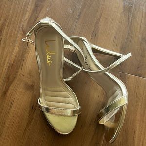 Gold high heels- worn maybe 30 minute for ceremony